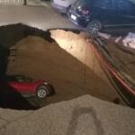 Huge sinkhole in Rome swallows cars